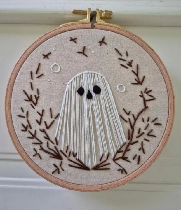 Customer embroidered ghost hoop with autumn branches