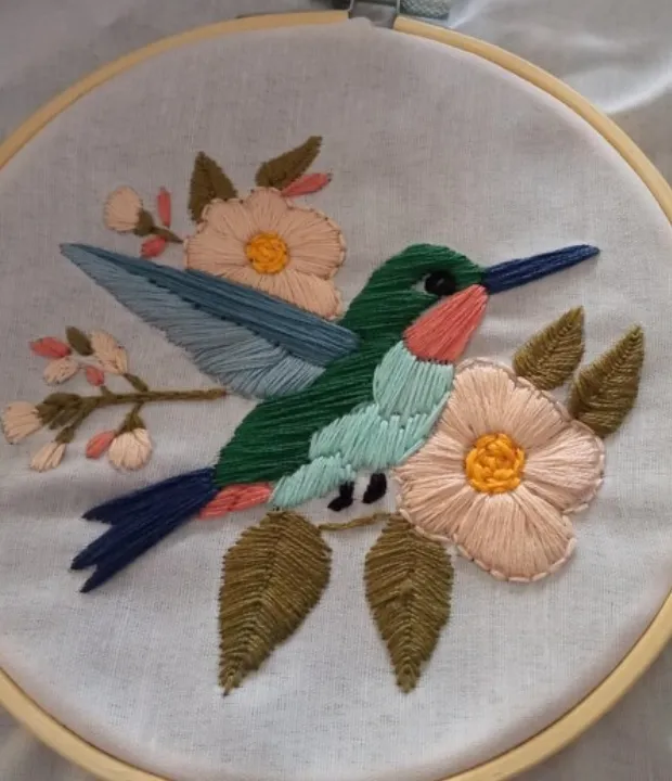 Customer embroidered hummingbird and flowers in hoop