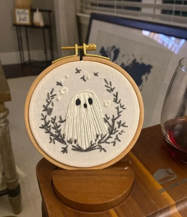 Customer embroidered ghost hoop with botanical wreath